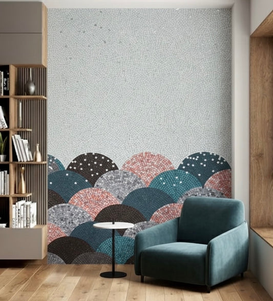 Modern living room with a blue armchair, round side table, and mosaic mural.