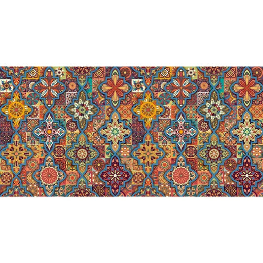 Colorful patterned rug with geometric designs on a white background