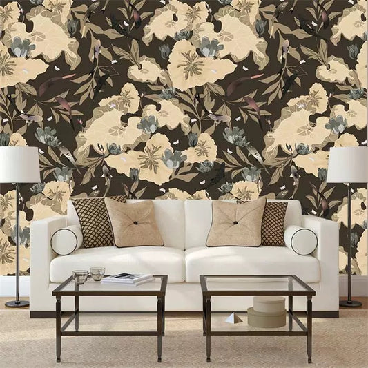 Living room with floral wallpaper, white sofa, and decorative pillows.