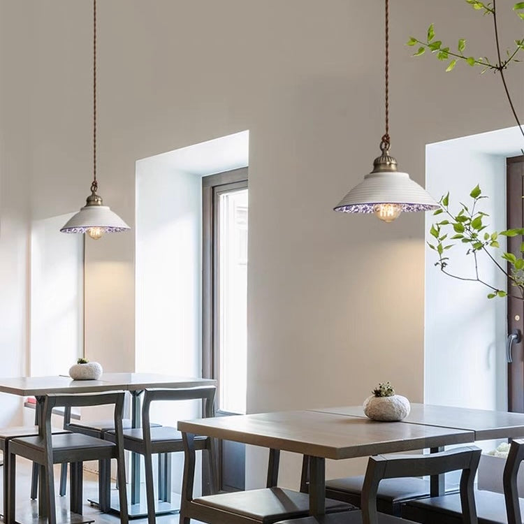 Modern minimalist ceramic pendant light with blue porcelain shade and vintage copper finish for restaurants and cafés