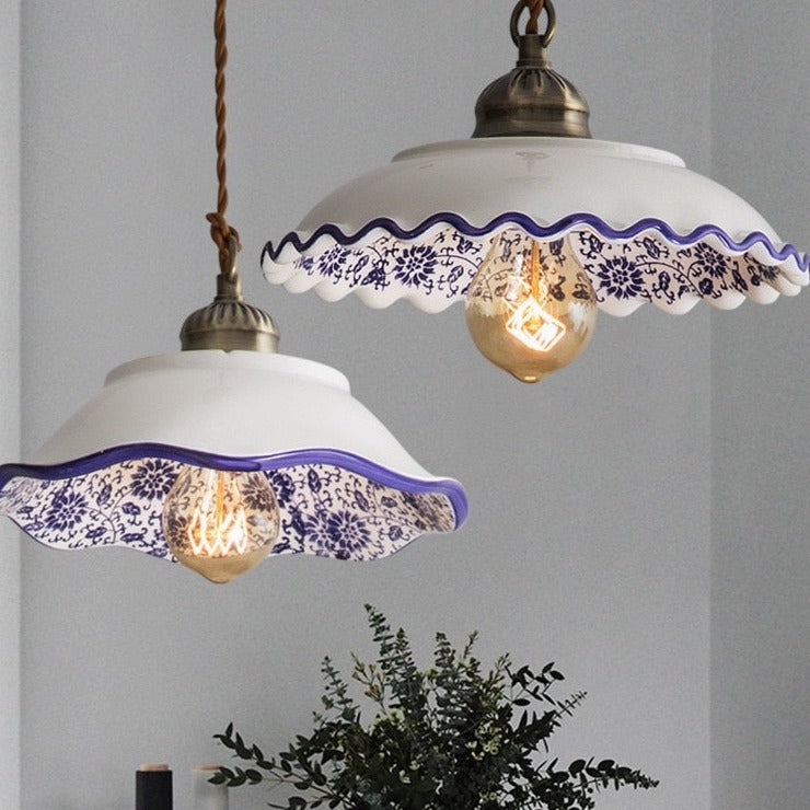 Modern minimalist ceramic pendant light with blue porcelain shade and vintage copper finish for restaurants and cafés