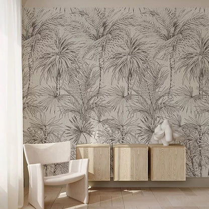 Room interior with palm leaf patterned wallpaper, wooden cabinet, and white chair.