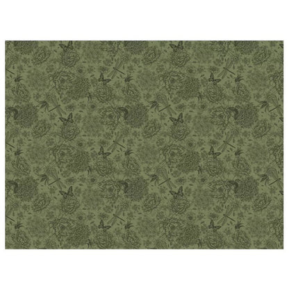 Green patterned paper with floral and arrow designs on a white background