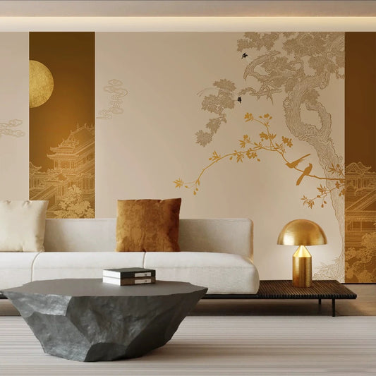 Modern living room with a white sofa, decorative pillows, a gold lamp, and wall art.