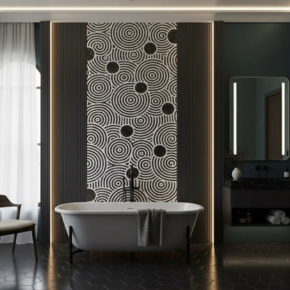 Modern bathroom with freestanding bathtub, mosaic mural and mirror.