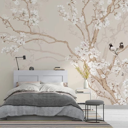 Bedroom with floral wall mural and gray bedding