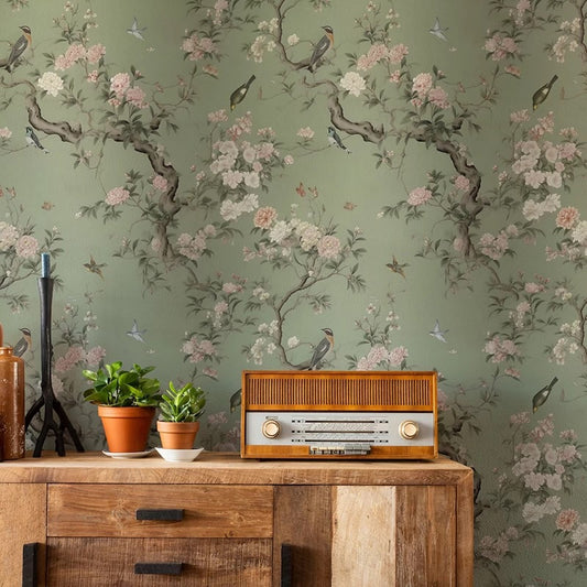 Vintage radio on a wooden console with floral wallpaper
